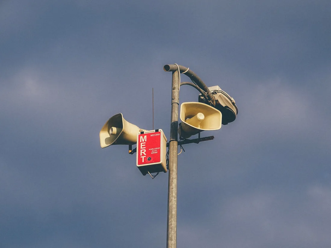 Outdoor security siren and speakers